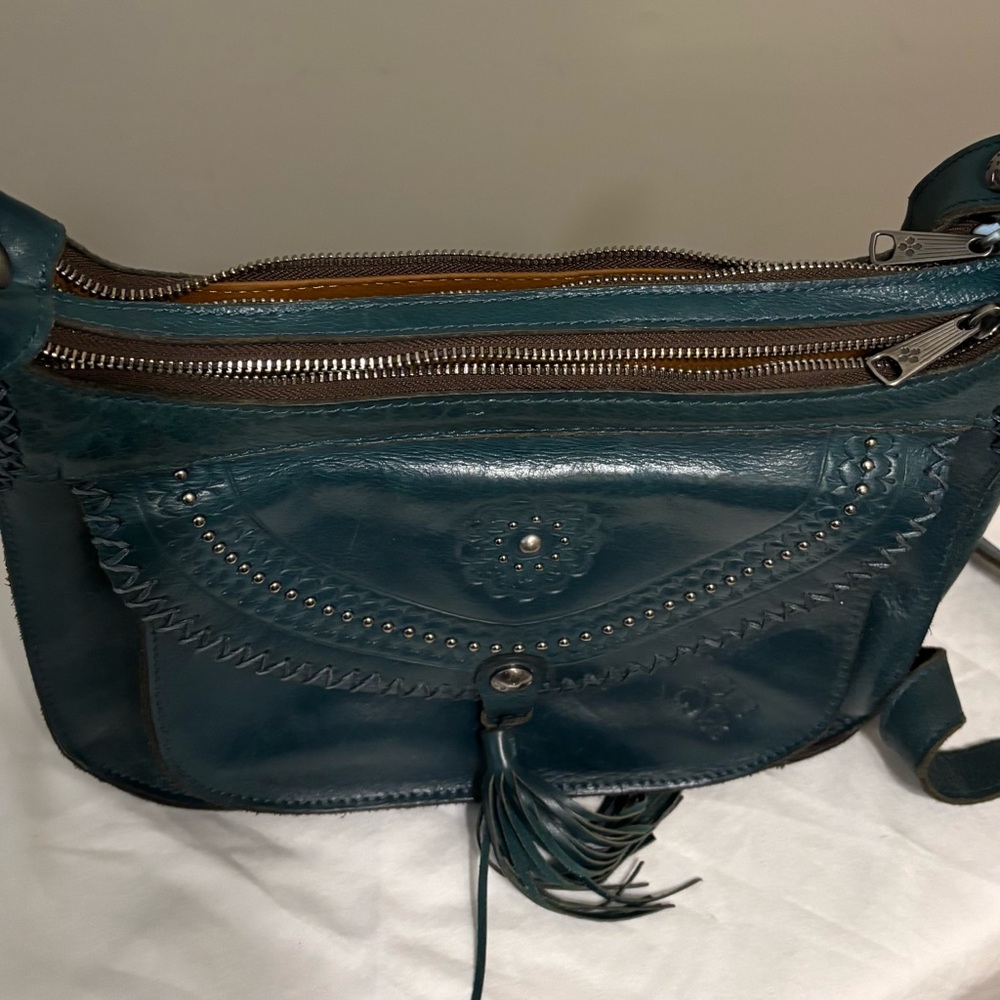 Patricia Nash Blue Shoulder Bag with Embossed Design and Tassel - Picture 2 of 12